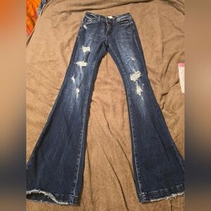 Distressed Blue Jeans